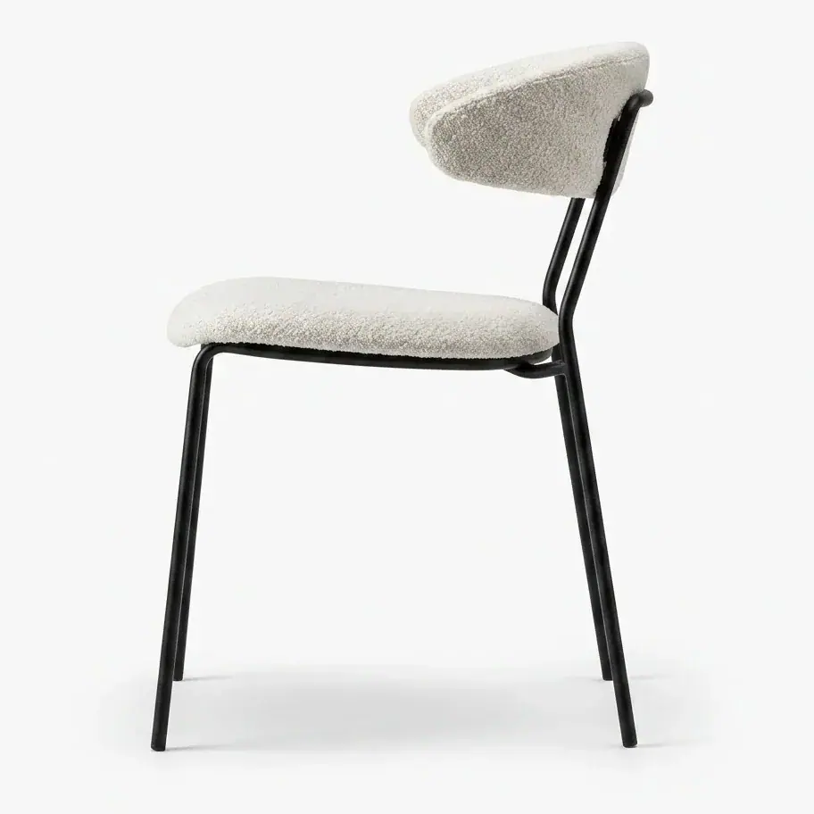 Silla de bouclé vista de perfil