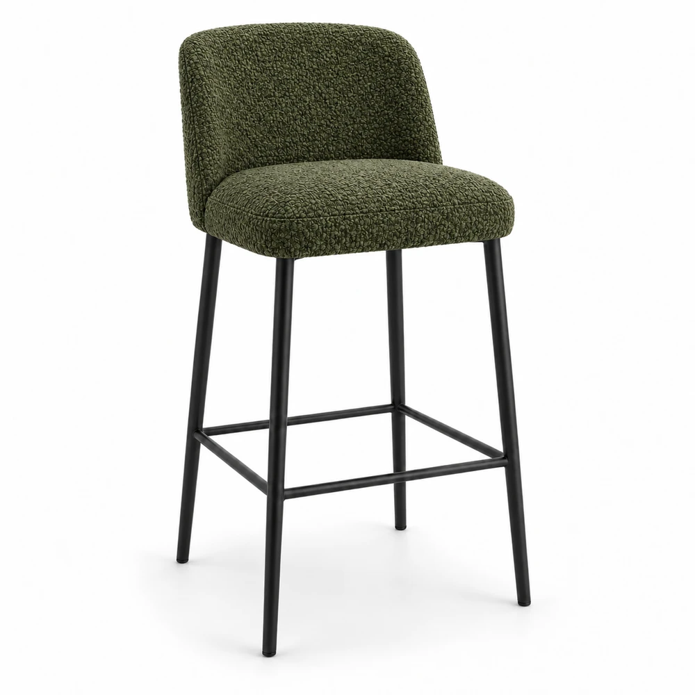 El taburete original con la misma forma, tapizado en bouclé verde oliva